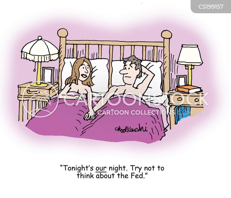 Man and Woman in bed, holding hands. The woman asks the man to try not to think about the FED tonight.