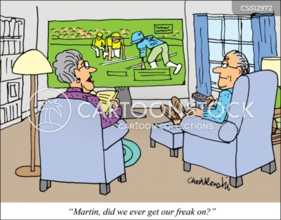Cartoon. A middle-aged couple is sitting in their respective comfy living room chairs. A football game is on TV. The husband is working the remote. The wife is reading. She looks up and asks, "Martin, did we ever get our freak on?"